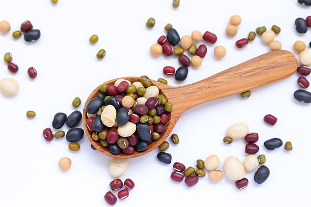istock Mixed beans ingredients in wooden spoon background 2234077628