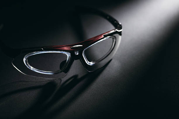 istock Close-up of stylish eyeglasses on dark background with dramatic 2234080331