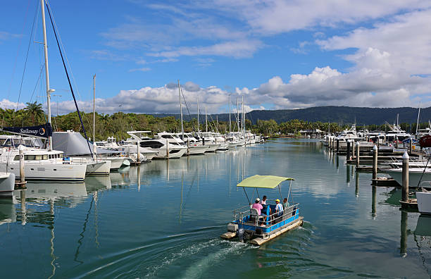 A harbour with some yachts on a sunny day in port douglas, summer festival, boating