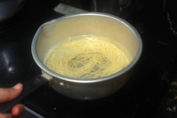 istock spaghetti is being boiled in a pan 2234085035