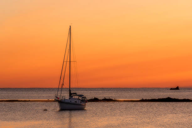 istock Back Harbour, Newfoundland sailboat at sunset 2234090147