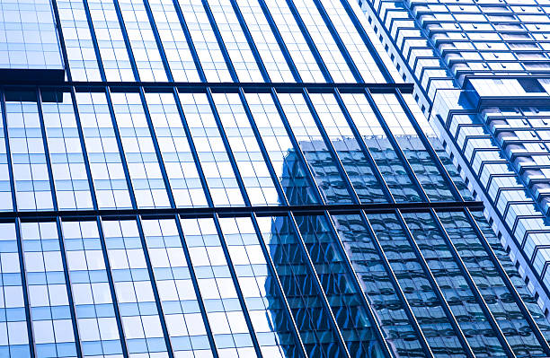 istock Low shot of visual dynamics of modern glass building background 2234092604