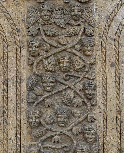 istock Column with figures of angels sculpted in stone 2234093107