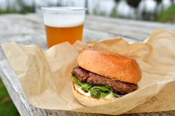 istock Delicious-looking hamburgers and beer. 2234097852
