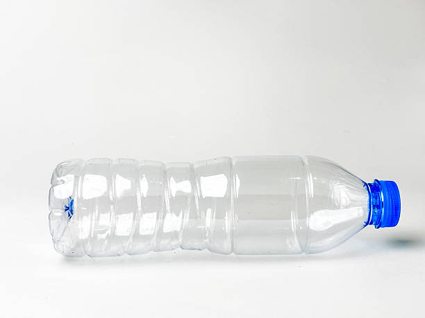 istock Recyclable PET Bottle with Blue Cap Showing Environmental Responsibility and Awareness to Help Promote Sustainability and Reduce Waste Featuring Clear Water Container on White Background 2234098857