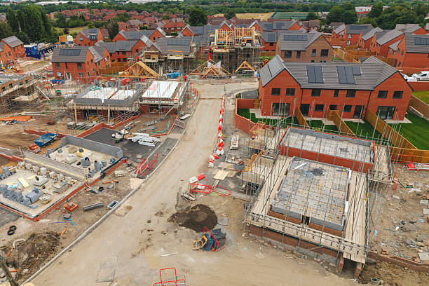 istock New residential construction progress in suburban area featuring modern homes and ongoing development with construction equipment on site 2234103140