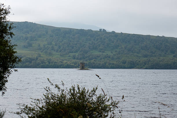 Appin, Scotland - 22 May 2025: Looking from the road between Appin and Port Appin across Loch Linnhe towards Castle Stalker and the distant hills.