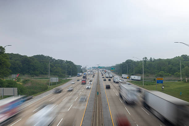 istock Busy Highway with Speeding Vehicles on Overcast Day 2234118523