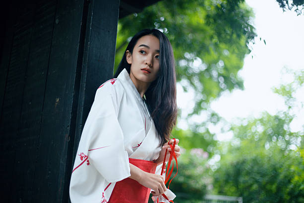 Asian beauty wearing kimono in the park