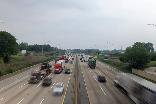 istock Busy Highway With Moving Traffic On Overcast Day 2234123626