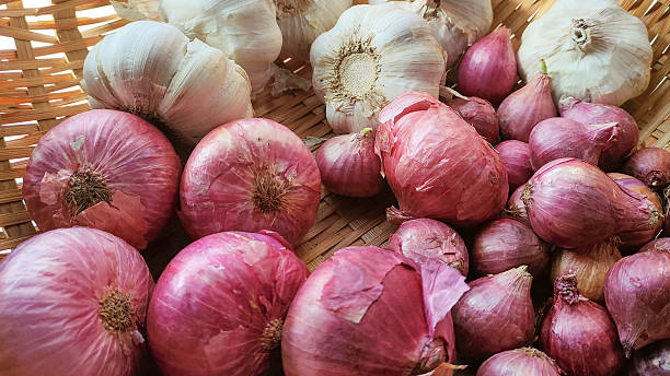 Close-Up of Fresh Red and White Onions in Detail