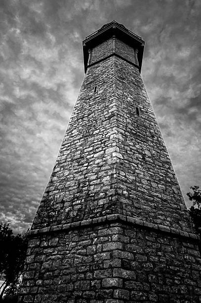 Details of the ghost town (or rather ghost village) Anavatos in the mountains of the Greek Island of Chios in the Aegean Sea in winterr (late December) in black and white. Anavatos (Greek: Ανάβατος) is a medieval, now abandoned, village located 16 km north-west of Chios Town. The village was established in the Byzantine era, probably by workers of the nearby Monastery of Nea Moni. Above the village stands a medieval fortress. The village was abandoned after the Turkish massacre in 1822 and the devastating earth quake in 1881.The image was captured on old-fashioned black and white grainy ISO 400 film by an analogue 35 mm film camera. The granularity is real film grain (due to the presence of small particles of a metallic silver on the negative). Minimal post processing has been done (only adjustment of histogram). The image is part of a series of abandoned and partly ruined houses (ghost towns) in Greece.