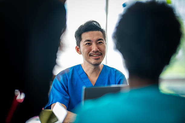istock Collaborating for Better Outcomes: Healthcare Team in Discussion 2234132548