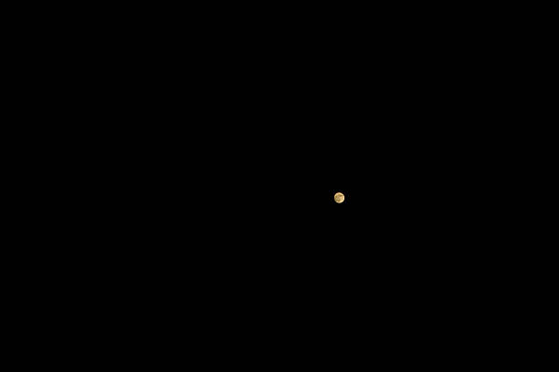 The moon in the dark sky