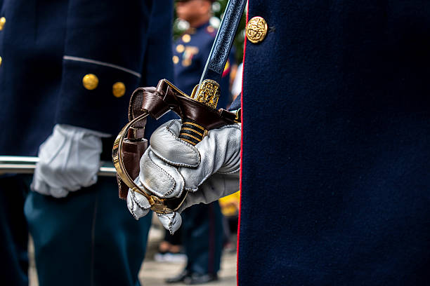 istock Soldier holding command saber, Military with sword in ceremony, Armed forces in protocol act 2234134886