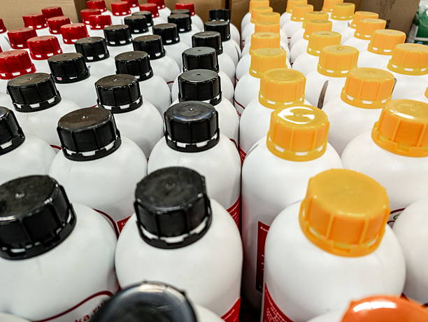 istock Bottles of various colored caps arranged closely in a storage area showcasing different contents and packaging designs for organizational purposes 2234135306