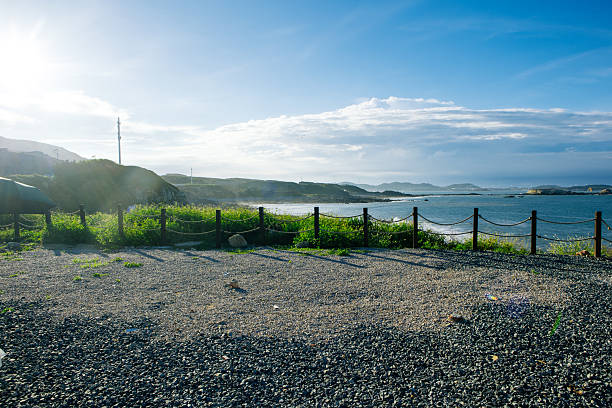 The spacious stone road by the seaside - suitable for use as a background for its car advertisements
