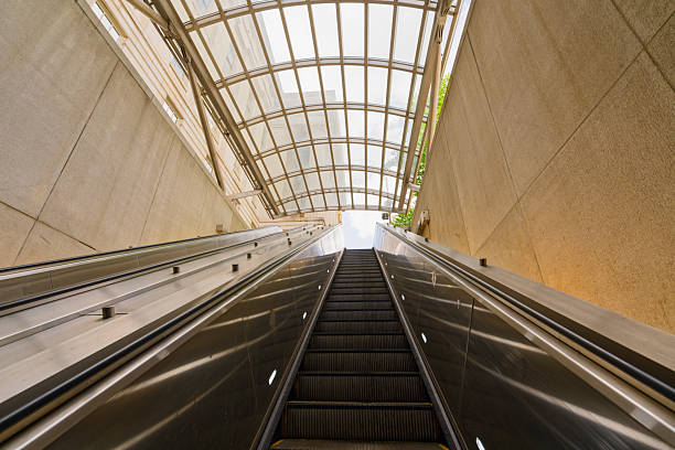 istock Escalator leading to street level under glass canopy 2234136539