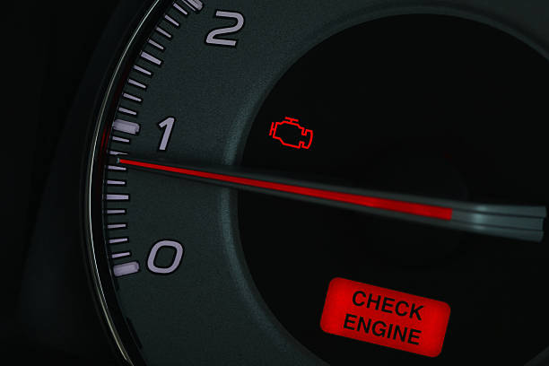 istock Close-Up of Car Tachometer with Illuminated Check Engine Light Warning Symbol 2234139244