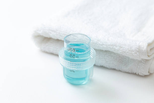 istock Laundry detergent and towels on white background. 2234140597