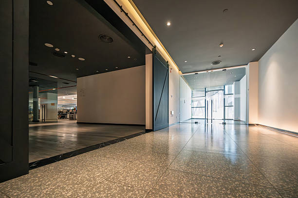 istock Spacious Corridor in a Modern Office Building with Minimalist Design and Natural Light 2234141515