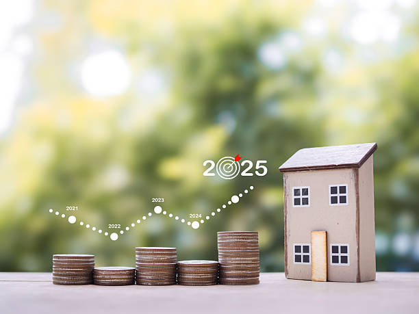 istock Miniature house and stack of coins with virtual increasing graph. The concept about price of house is growing up, Property investment, House mortgage, Real estate in year 2025 2234141852