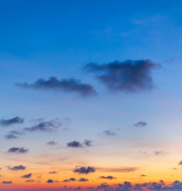 istock Morning clouds and sky with crescent moon,Gentle evening landscape: crescent moon against a blue sky with pink clouds at sunset 2234146541