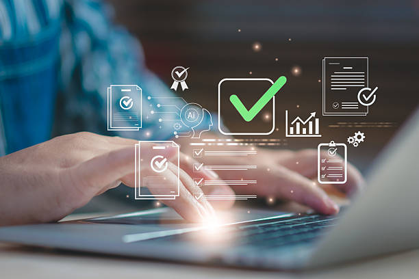 istock Concept AI-powered checklist and document control professional types on laptop, with floating check marks, reports, and graphs, symbolizing compliance verification, approval workflow, and efficiency. 2234147083