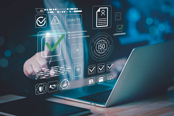 istock Concept of ISO compliance with AI-enabled checklist as professional taps virtual check mark on laptop, symbolizing certification, approval workflow, document control, and efficient auditing. 2234147084