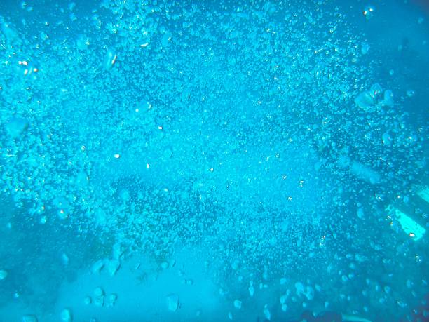 Red Sea, Egypt, 2022. Rising air bubbles from divers' oxygen tanks.