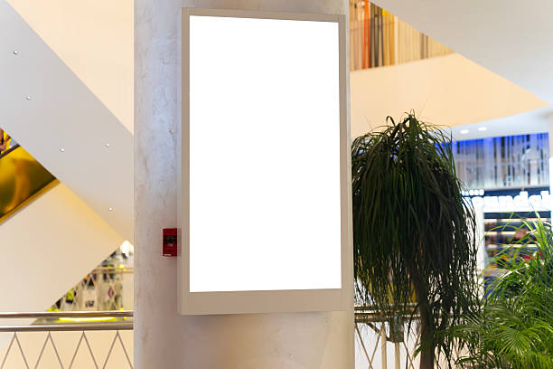 istock Blank billboard mockup in shopping mall interior, empty white advertising screen display for promotion 2234148542