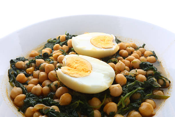 Chickpea, spinach, tomato and egg curry Healthy food