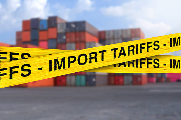 istock Cargo Ship Blocked by Import Tariffs Tape Symbolizing Trade Restrictions and Economic Barriers 2234152134