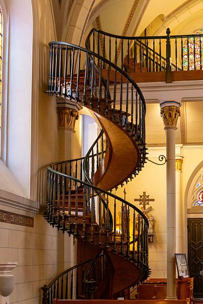 Stairs going up to the choir section in an old church n Vermont