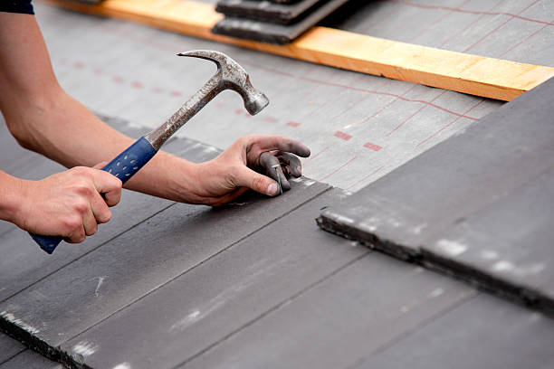 istock Construction worker carefully installing roofing materials on newly built residential structure with scaffolds surrounding working area ensuring safety and accessibility 2234159730