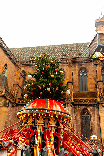 istock City adorned with festive Christmas decorations and a lively carousel 2234162026
