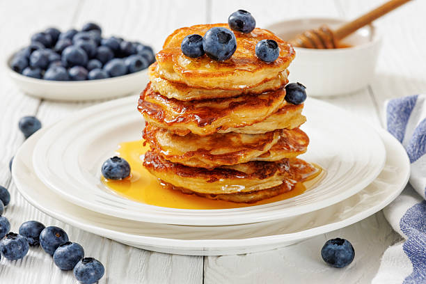 istock fried hot and crispy pancakes with blueberries 2234171201