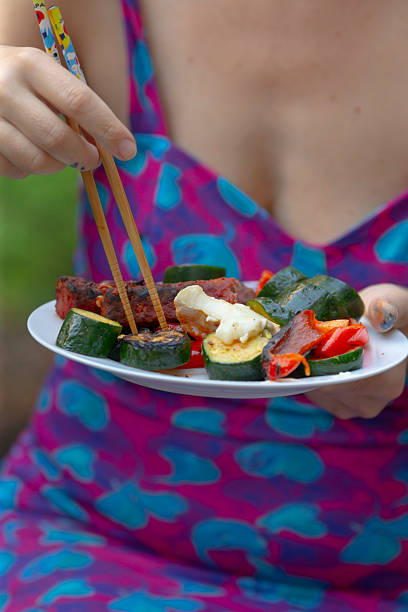 istock Asian-Inspired Meal with Vegetables and Chopsticks 2234171228