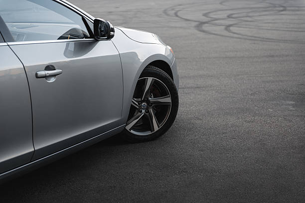 Close-up of modern alloy car wheel in colors of black and chrome.