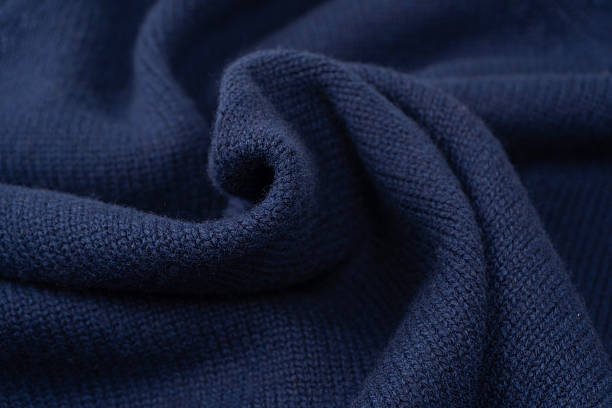 istock Navy blue merino wool sweater texture as background. Top view. 2234176359