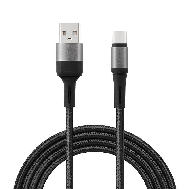 istock Black cable for charging and synchronization with Type - C and USB connectors on a white isolated background 2234176643
