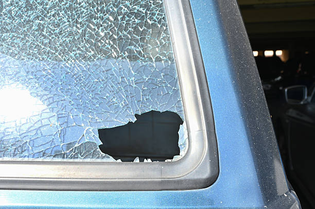 istock Daytime View of Rear Car Window Smashed by Thieves Overnight 2234177576
