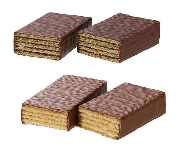 istock broken sweet chocolate waffles isolated on white background. 2234185608