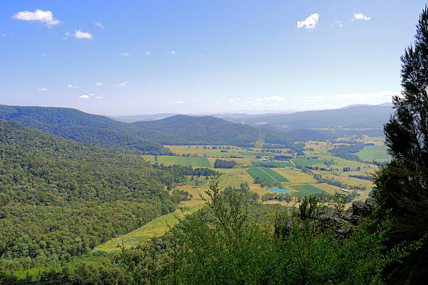 Mountain landscape, sun over walls