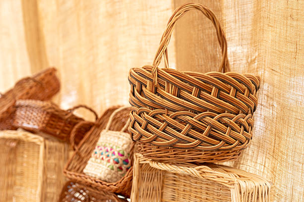 Display of wicker baskets with intricate woven patterns, showcasing traditional craftsmanship at a market