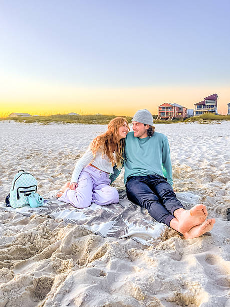 istock Couple Enjoying Sunset at the Beach 2234204942