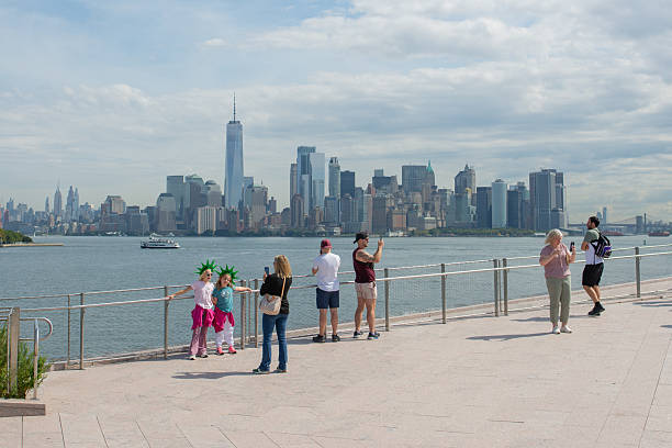 View of downtown Manhattan from Liberty Island. Visible are tourists visiting the Island to see the Statue of Liberty