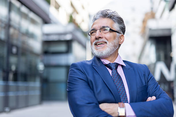 istock Confident Businessman Smiling Outdoors in Modern City 2234209158