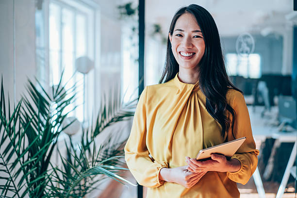 istock Confident businesswoman in modern office. 2234217572