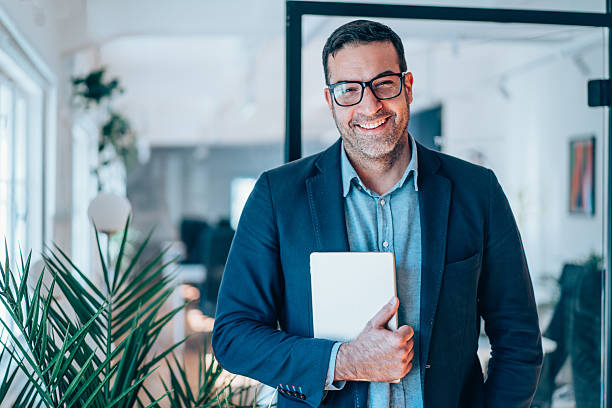 istock Confident businessman in modern office. 2234217581